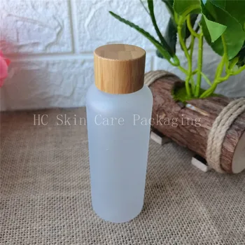100 adet / grup buzlu şeffaf plastik toner şişeleri bambu woo döner kapaklı şişeler boş uçucu yağlar kozmetik ambalaj şampuan